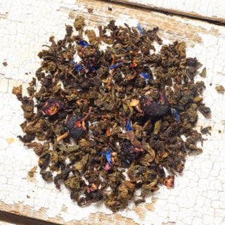 Our oolong pair amazingly with blueberry.  A touch of crème brulee adds smooth sweet cream notes. 
We love this tea with a touch of local honey to bring out the sweetness of the blueberry. 
Our tea sacks infuse a flavorful 16-ounce mug or travel-sized cup.  
Low Caffeine 
Ingredients: Oolong, Blueberries, Blue Cornflowers, Natural Blueberry and Crème Brulee Flavors