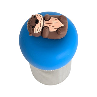 Blue container with a cartoon otter on top against a white background