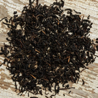 Photograph of Lapsang souchong Loose Tea Leaves, available in tea bags, steep and serve organic iced tea, custom tea blends in Lancaster PA. Shop for organic tea now at pureblendtea.com