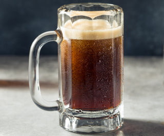 Root beer flavor infused into a tea. Photo of a root beer mug to show the flavor profile.